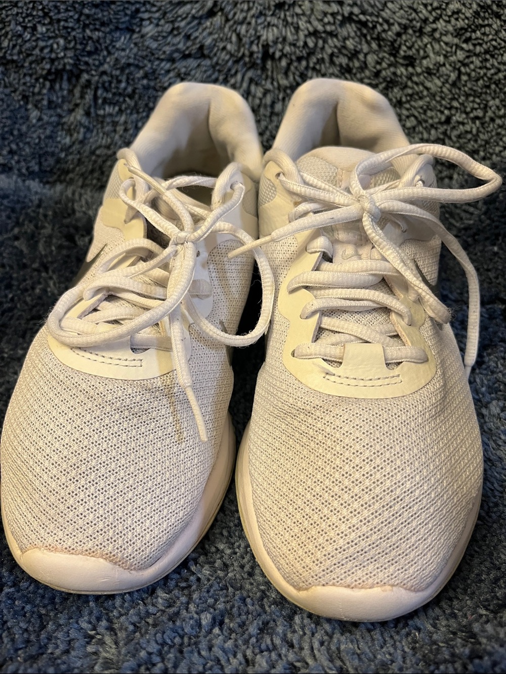 Women’s Nike Revolution white running sneaker 
Size 8